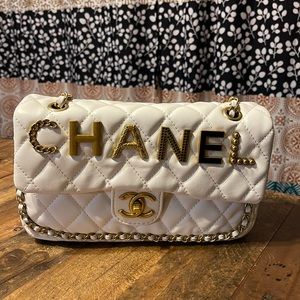 White and gold bag.